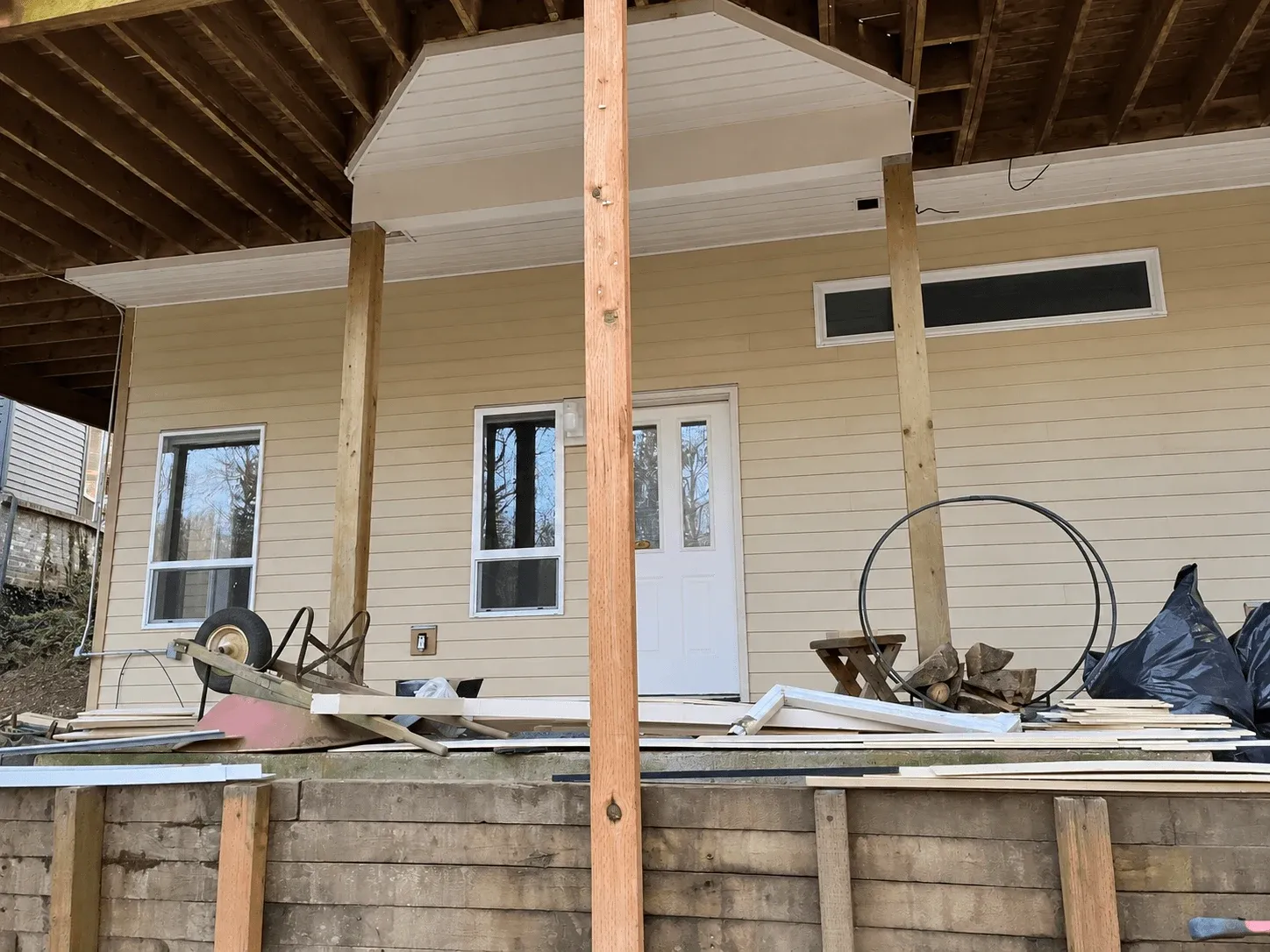 Covered area under the upper deck with new support posts