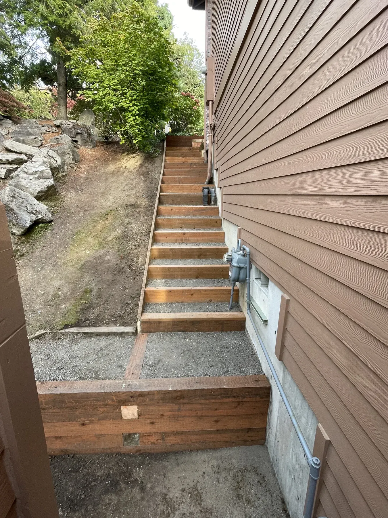 New outdoor staircase framing beside a home during construction